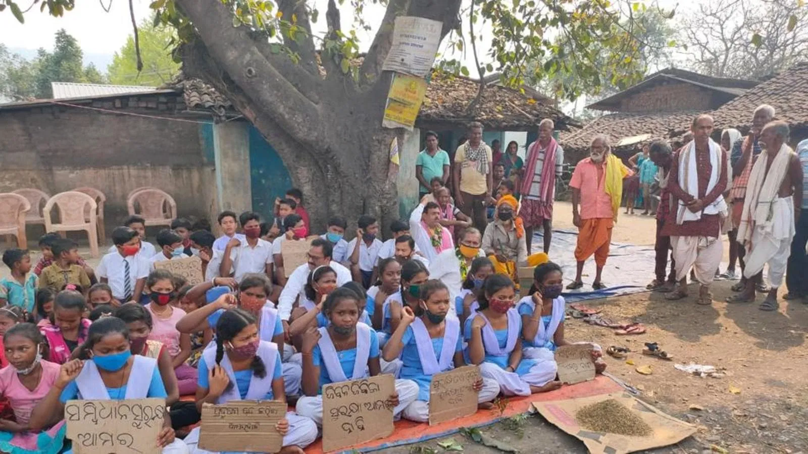 Villagers carry children across river in Sundargarh as bridge missing