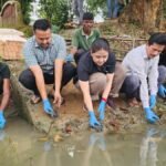 Turtle hatchlings being released into a rhino habitat in Odisha as part of a conservation program