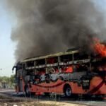 Emergency responders at the scene of a burning bus in Jaisalmer after a deadly fire accident