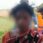 a young girl looking sad in a rural setting