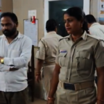 Police officers in uniform standing with a rescued person