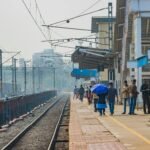A view of Indian railway tracks with trains and stations
